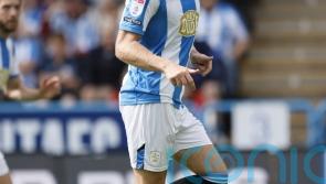 Jack Whatmough and Cameron Ashia continue Huddersfield’s winning start