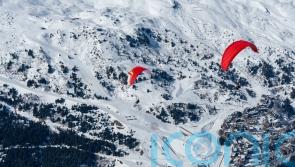 Paragliding above the French Alps: How to take your ski holiday to another level