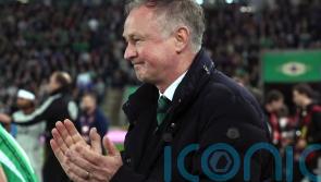 Michael O’Neill enjoys joke about long-ball tactics after narrow Germany defeat