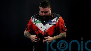 Former world champion Michael Smith among seeds to crash out in second round
