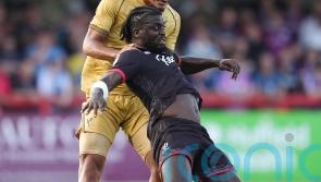 Kabongo Tshimanga&rsquo;s debut double gives 10-man Barnet a battling win over Oldham