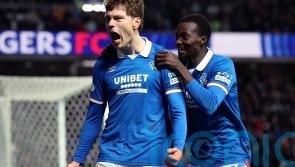 Rangers close gap on leaders Hearts with victory over 10-man Kilmarnock