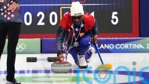 Snoop Dogg requests photo with British curlers at Winter Olympics