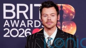 Florals, feathers and colour flashes on glittering Brits red carpet