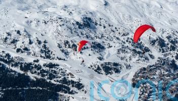 Paragliding above the French Alps: How to take your ski holiday to another level