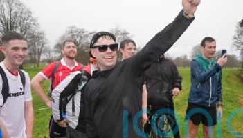 Kneecap&rsquo;s Moglai Bap greeted by Irish president during charity run