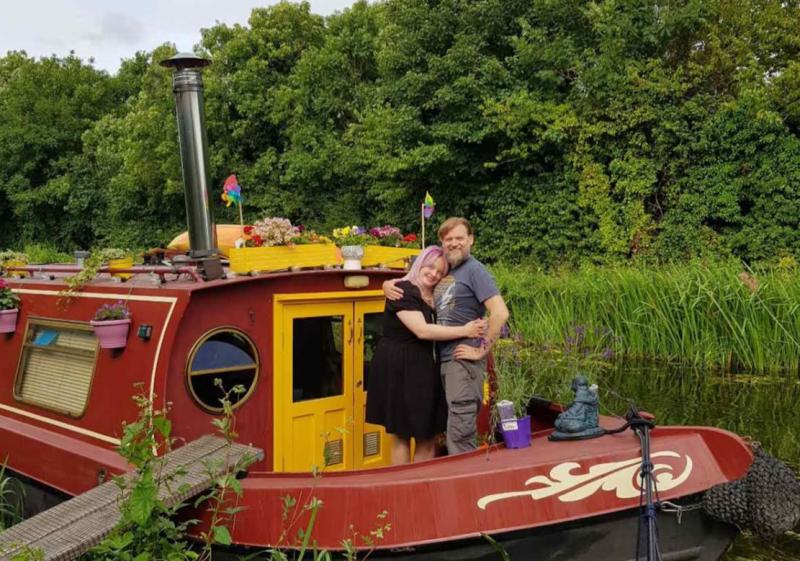 Barry Madden from Tullamore and his wife Emma O'Sullivan on their beloved houseboat in Sallins