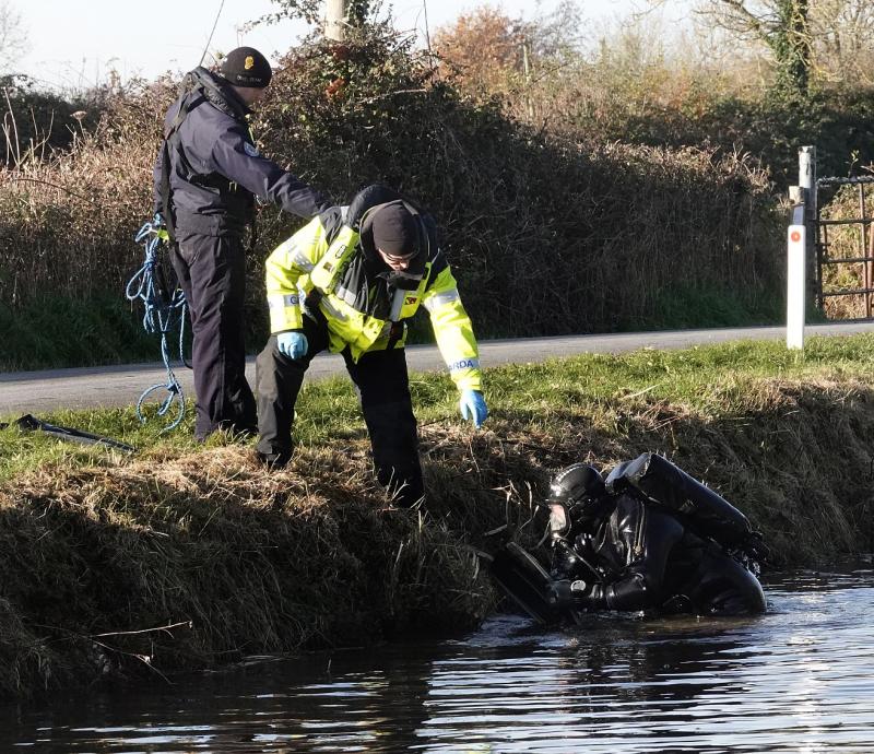 Garda divers searching the canal. Picture Michael Scully