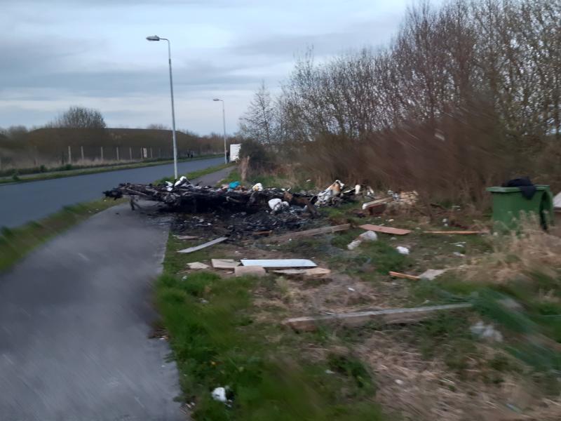 Remains of burnt out caravan left on footpath in Edenderry