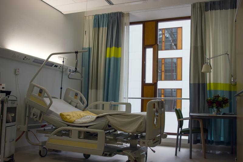 How many confirmed cases of Covid-19 are in hospitals in Offaly, Laois and Kildare