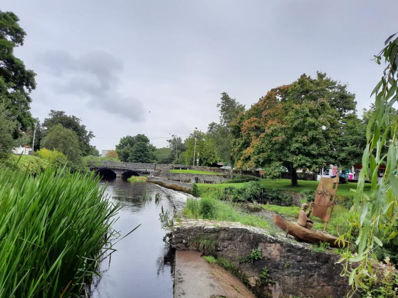 The river Camcor, Birr (with a sculpture of St Brendan by local artist Paradzai Havatitye)