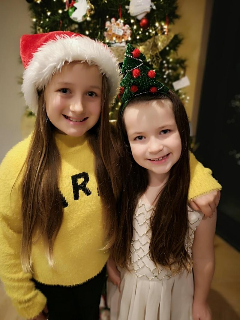Ava and Anna cutting their lengthy locks for a good cause