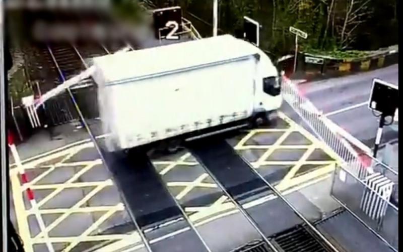 WATCH: Irish Rail shares footage of a lorry ploughing through level crossing barrier causing delays