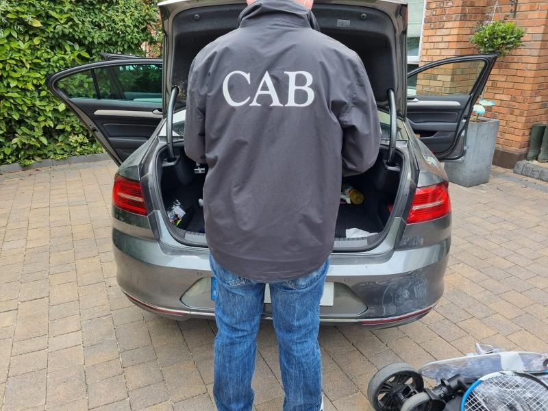Criminal Assets Bureau seize car, cash and luxury goods in raids in Louth, Dublin, Meath and Wexford