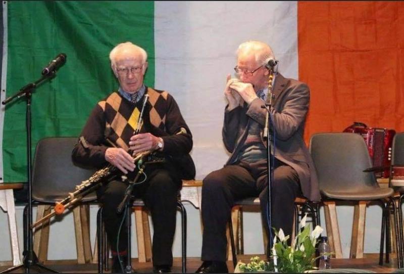 Billy Dowling, right, playing the harmonica with Tom Nolan.