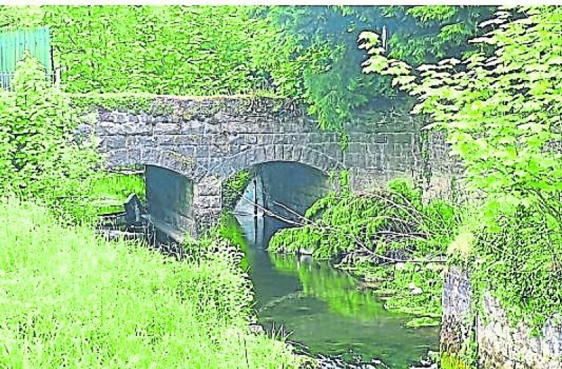The old cutstone bridge over the Tullamore River at the back of Main St