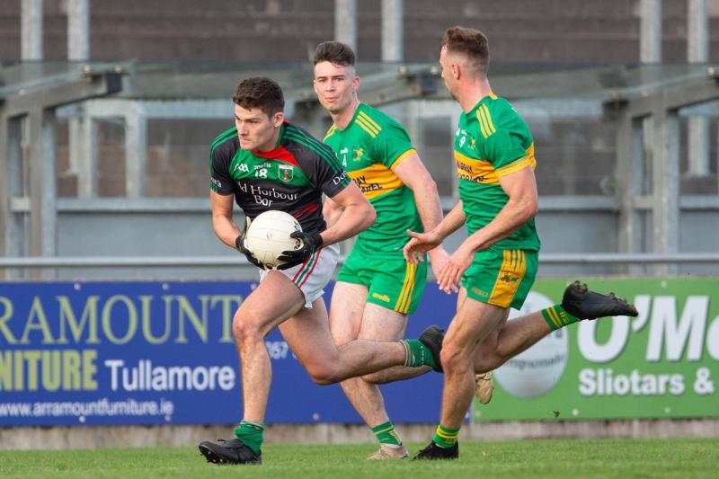Durrow's Micheal Mooney and Rhode's Conor McNamee and Dylan Kavanagh.