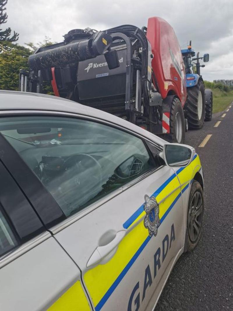 Tractor driver in Midlands pulling heavy machinery caught on mobile phone while driving