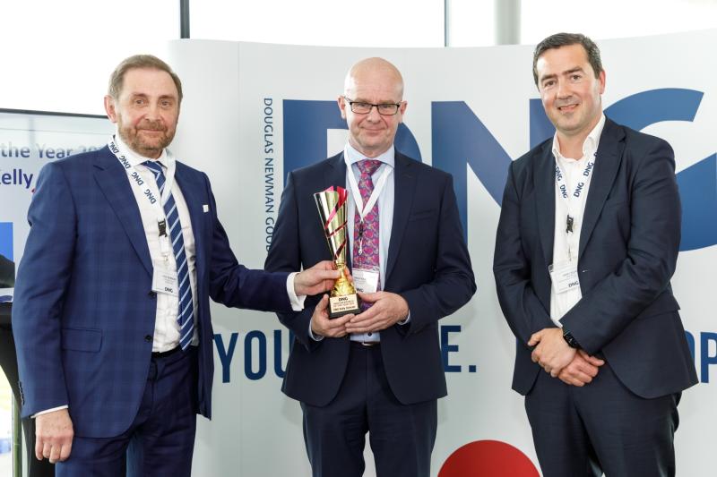 Pictured (centre) accepting his award with Paul Newman, DNG Chairman and John Callan, Head of Product and Client Solutions, MyHome.ie is Philip Kelly, Sales Manager DNG Kelly Duncan.