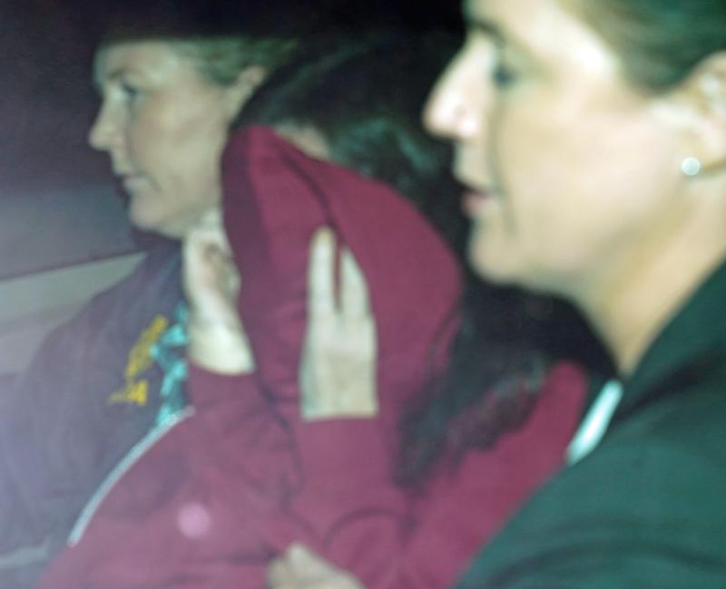 Lynn Egar, 48, (purple hoodie) arrives for a special sitting of Mullingar District Court, Co Westmeath, where she was charged with the murder of her two children.