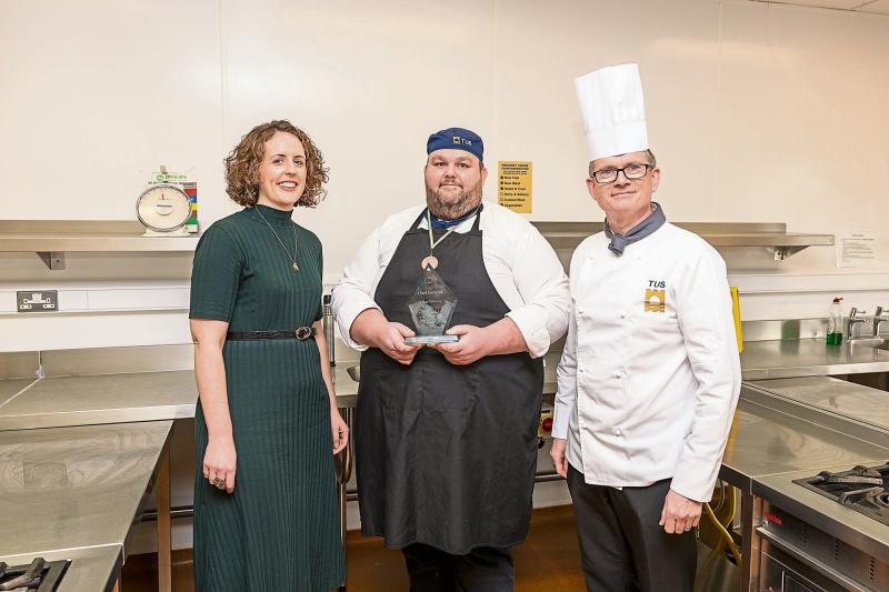 Martin Duffy (Class winner, Chocolate Sculpture competition) is pictured with his mentor culinary arts lecturer Kevin Ward and Dr Emma Reardon