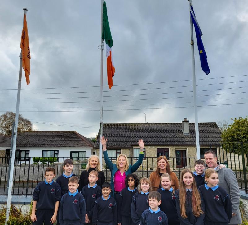 MEP raises Blue Star Flag and Amber Flag an school in Roscrea