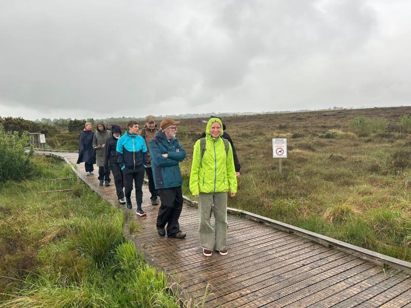 On the boardwalk. Members of Clara Heritage Society enjoying a walk through their famous raised bog