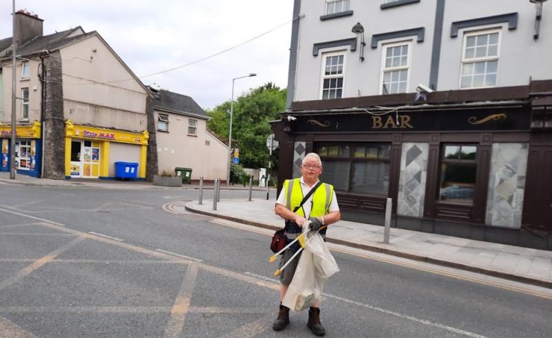 Loughlin Sweeney was busy picking up litter when we met him  early  last Saturday morning 