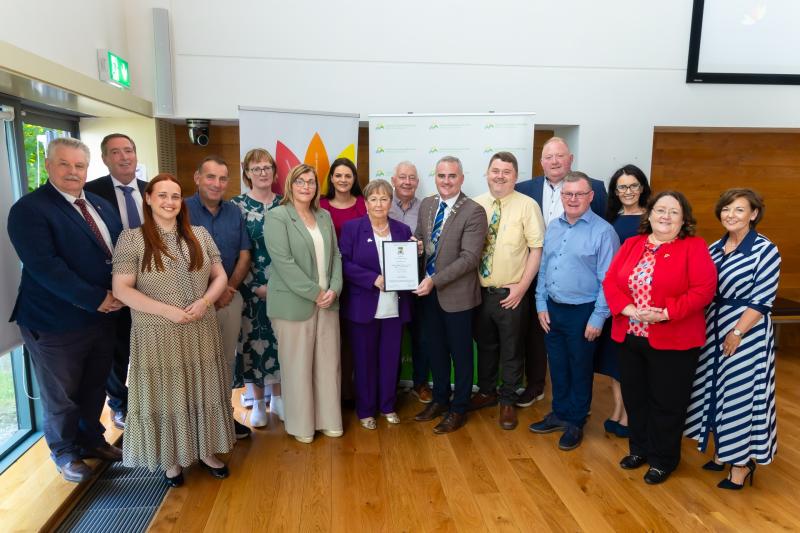 Joining the Cathaoirleach Cllr John Leahy and Chief Executive Anna Marie Delaney in presenting the scroll to Offaly’s Older Peoples Council Chair Molly Buckley were elected reps & Dept Tony McCormack