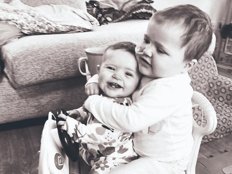 A photo of the Duggan sisters Saoirse and Éabha playing together in happier times.