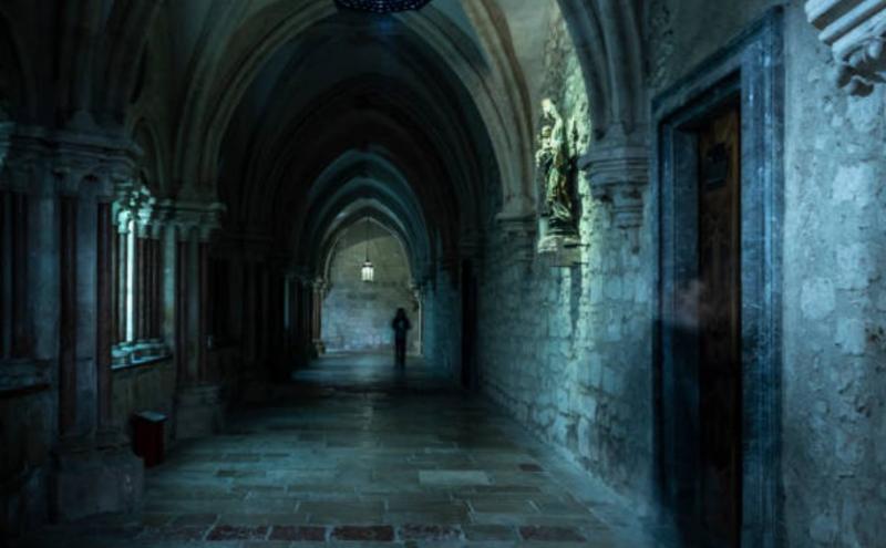 A dark castle at night