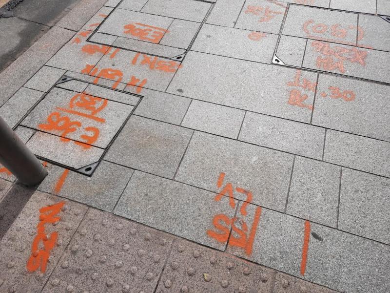 Tullamore footpaths covered in orange, blue and white numbers