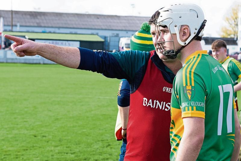 Kilcormac/Killoughey Manager Declan Laffan gives instructions to Mark Mulrooney before he enters the field of play. Ger Rogers Photography