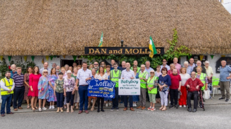 Members of the community of Bllyboy outside Dan and Molly's 