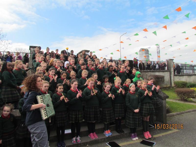 Scoil Mhuire read Proclamation and proudly raise Irish flag
