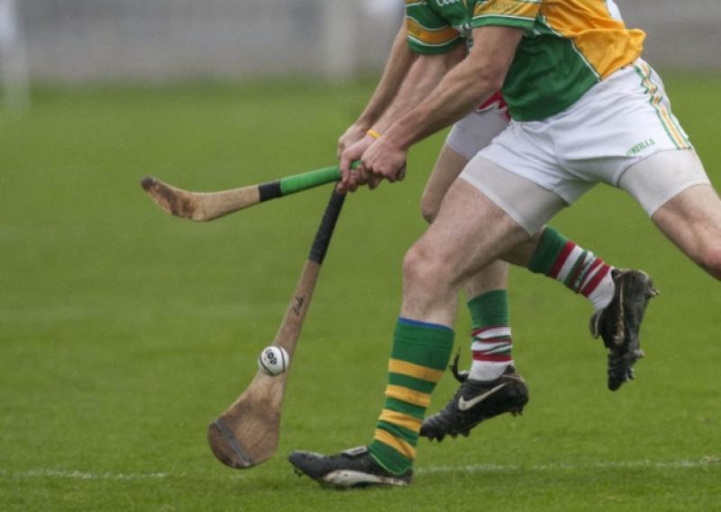 Enda Meagher sends this ball in for Rathdowney Errill against Brian Leonard, Kilcormac-Killoughey who breaks his hurley in the challenge in the Leinster Club SHC at O'Connor Park.Picture: Alf Harvey.