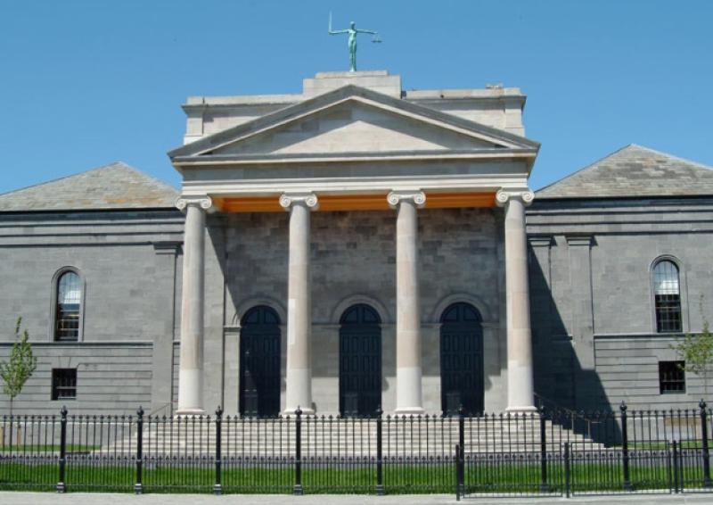 Roscrea men who threw object at car found guilty of criminal damage