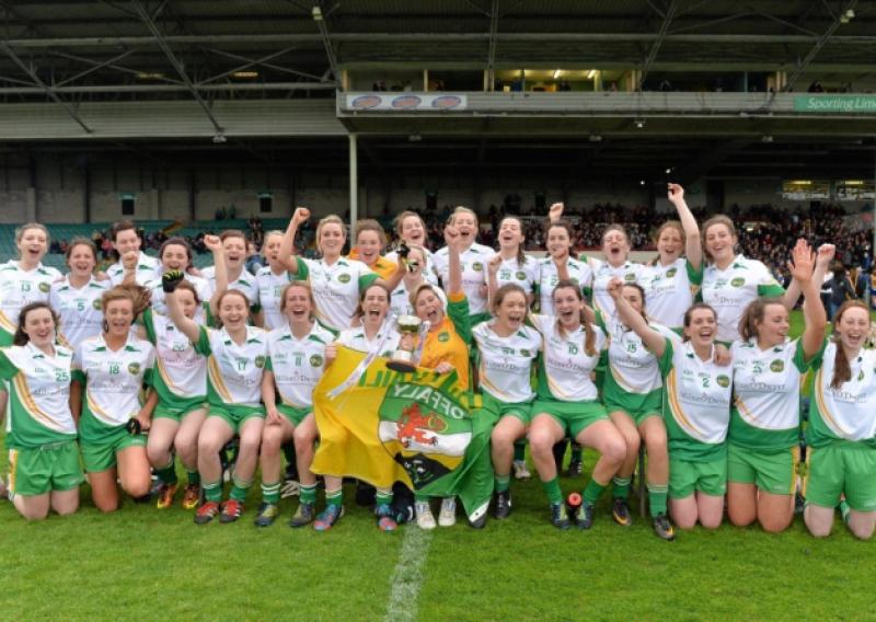 4 May 2013; The Offaly team celebrate with the cup after victory over Roscommon. TESCO HomeGrown Ladies National Football League, Division 4 Final, Offaly v Roscommon, Gaelic Grounds, Limerick. Picture credit: Diarmuid Greene / SPORTSFILE *** NO REPRODUCTION FEE ***