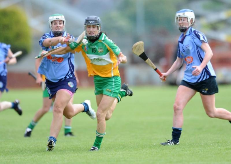 ***No repro fee** 22 June 2013: Tina Hannon, Offaly, in action against Grainne Quinn, left and Eimear McCarthy, Dublin. Liberty Insurance Senior Camogie Championship Group 1. Dublin v Offaly,  OToole Park, Crumlin, Dublin. Picture credit: CQPhotography