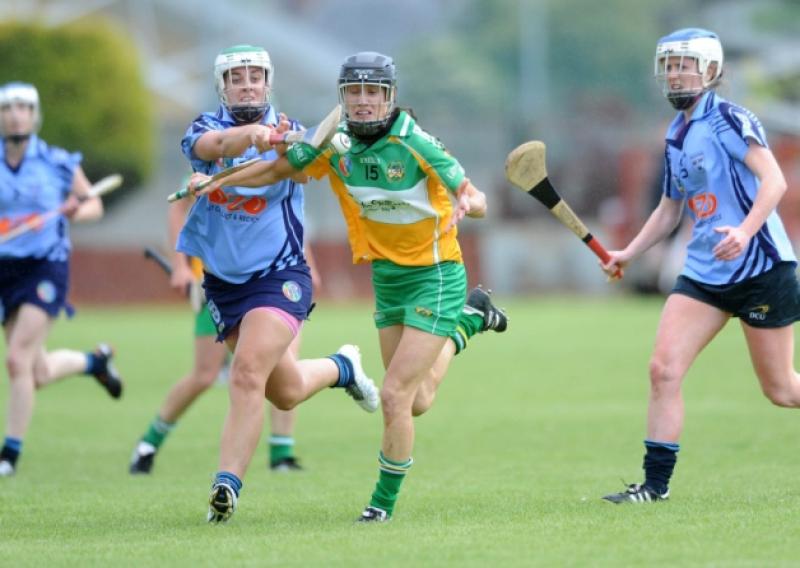 ***No repro fee** 22 June 2013: Tina Hannon, Offaly, in action against Grainne Quinn, left and Eimear McCarthy, Dublin. Liberty Insurance Senior Camogie Championship Group 1. Dublin v Offaly,  OToole Park, Crumlin, Dublin. Picture credit: CQPhotography