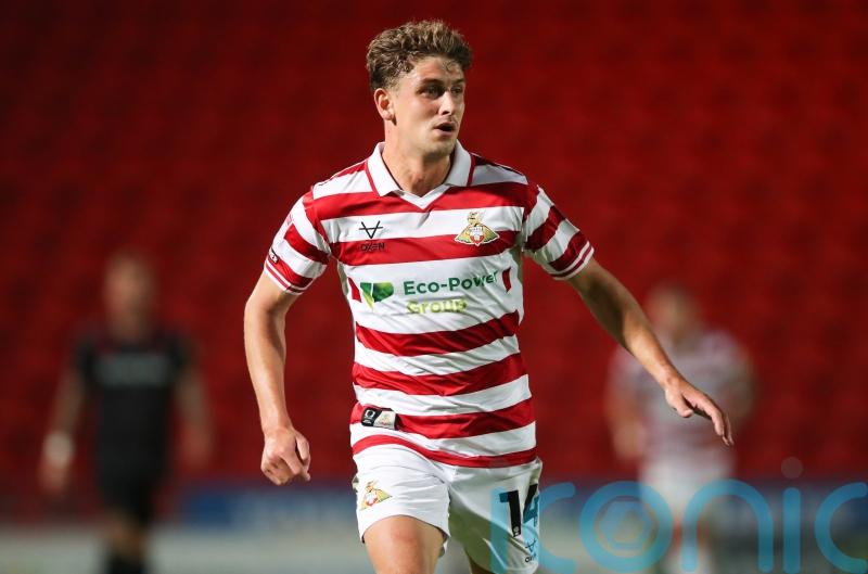 Doncaster deny former boss Richie Wellens with Harrison Biggins header