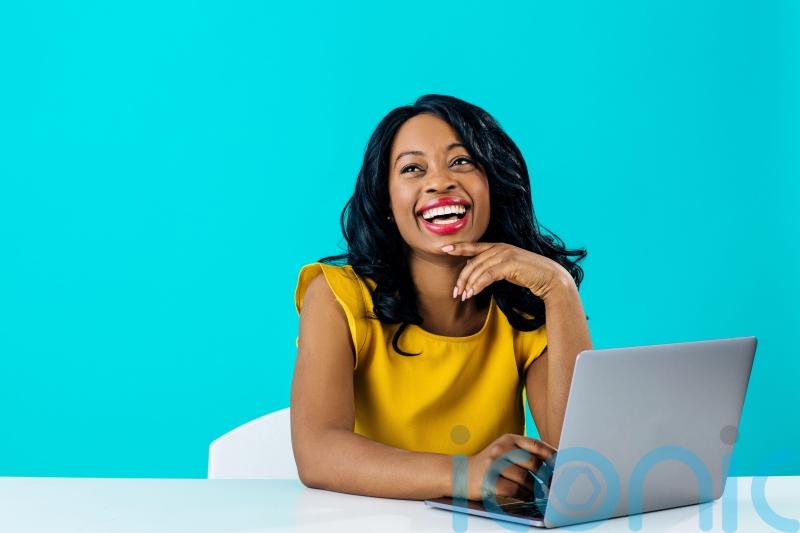 Easy ways to feel instantly happier at work, according to coaches