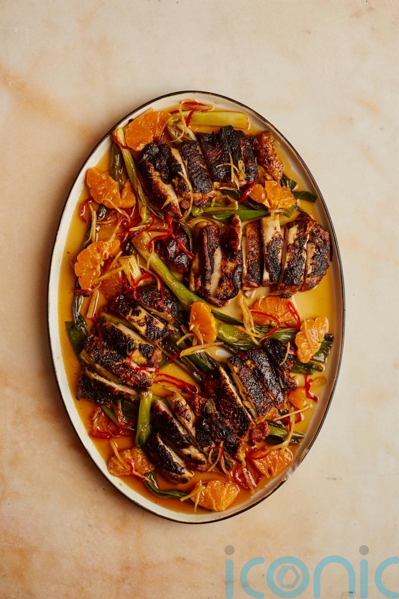 Ottolenghi Test Kitchen’s blackened chicken with caramel and clementine dressing recipe