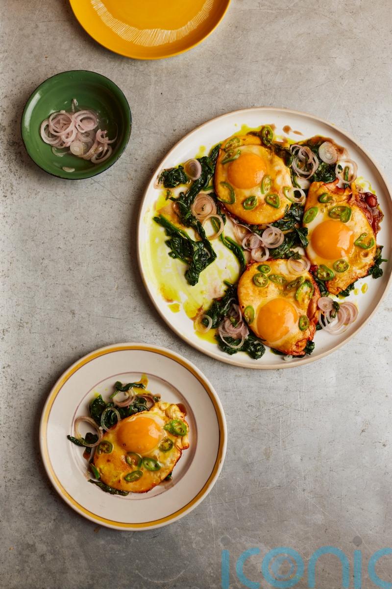 Ottolenghi Test Kitchen’s turmeric fried eggs with tamarind dressing recipe
