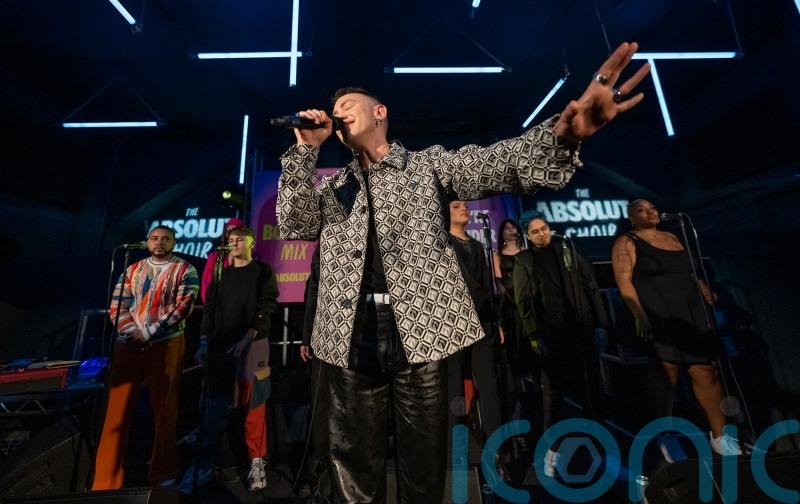Olly Alexander performs with choir celebrating diversity