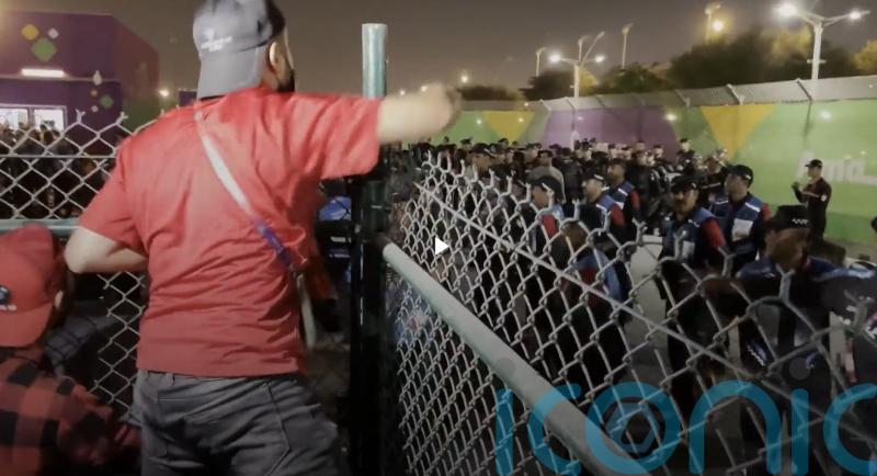 Riot police deployed outside World Cup stadium for Morocco v Spain game