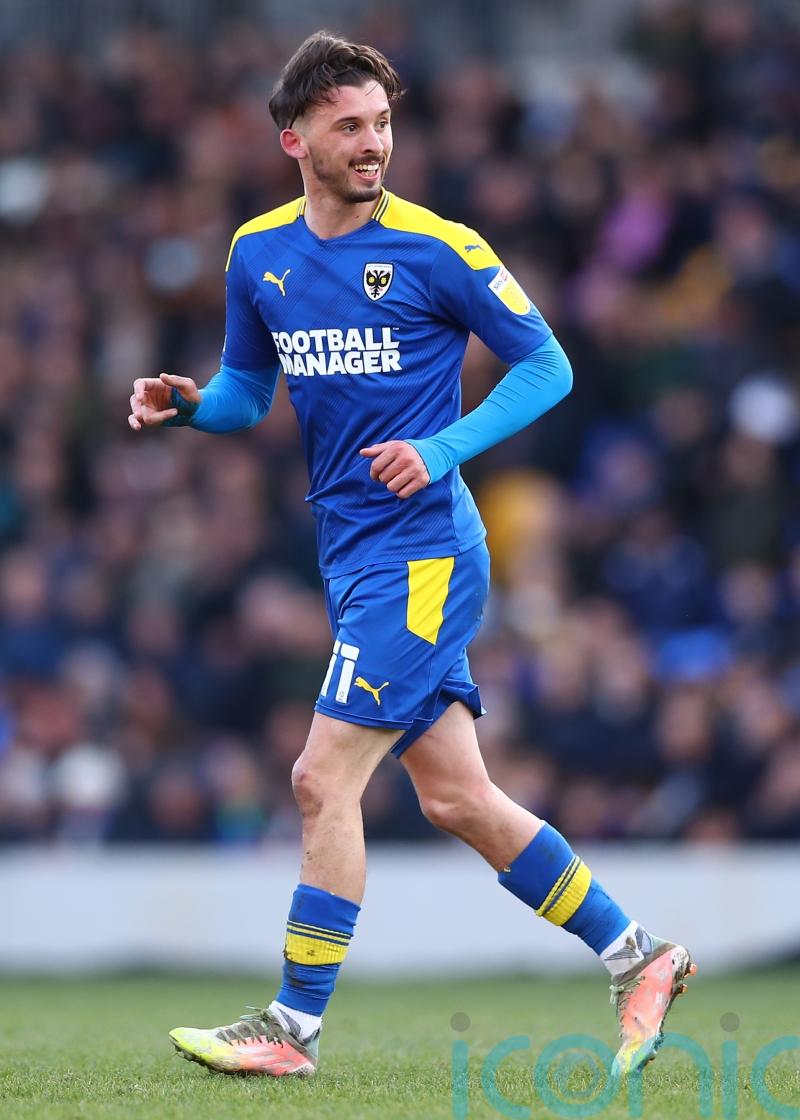 AFC Wimbledon extend unbeaten run to eight after draw at Swindon