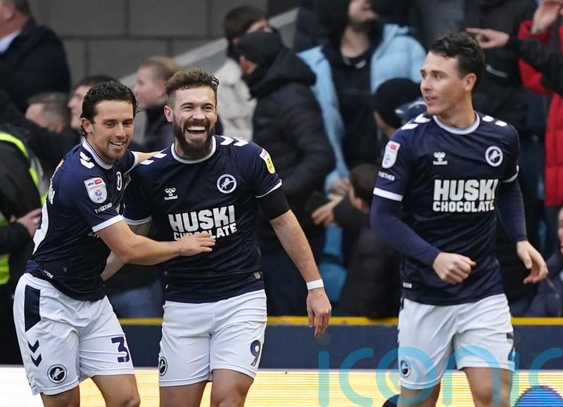 Tom Bradshaw’s double against Rotherham lifts Millwall into play-off places