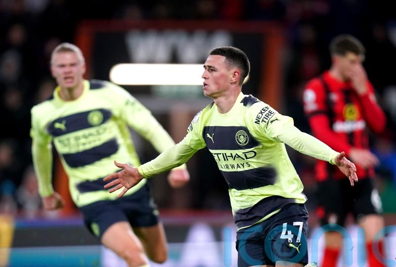Four-goal Manchester City keep pressure on Arsenal after easing past Bournemouth