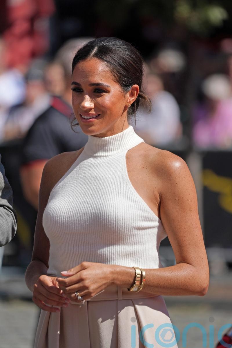 Duchess of Sussex ‘proud’ to contribute cake recipe to charity cookbook